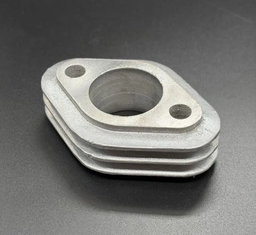 Carburettor spacer alloy